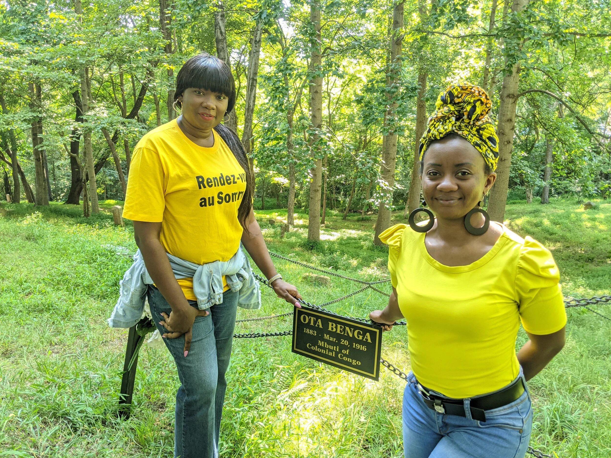  Hon. Christelle Vuanga and Mme. Laetitia Basondwa from the Democratic Republic of the Congo (DRC) in White Rock Cemetry, believed to be the final resting place of Ota Benga. Photo taken by Museum Director Ted Delaney 