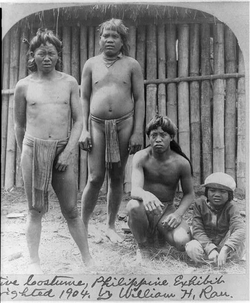  Indigenous men from the Philippines exhibited at the St. Louis World Fair, 1904. Ota Benga and his companions from Africa would have been exhibited in a similar fashion, with their traditional clothing and housing structures. Image courtesy of the Library of Congress 